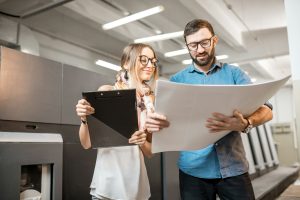 woman-with-print-operator-at-the-manufacturing.jpg